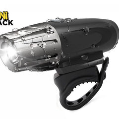 A black and silver waterproof bicycle headlight with a bright illuminated front beam, shown on a white background with a 'Kini Shack' logo in the top-left corner.