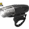 A black and silver waterproof bicycle headlight with a bright illuminated front beam, shown on a white background with a 'Kini Shack' logo in the top-left corner.