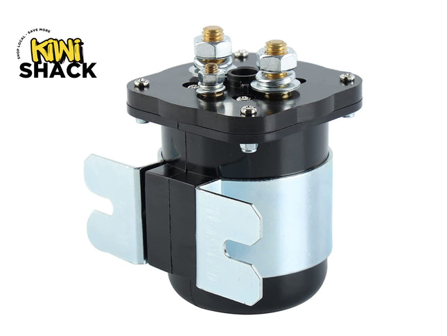 A black and silver motorcycle alternator with gold-colored terminal nuts, shown on a white background with the 'Kini Shack' logo in the top-left corner.