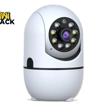 A white indoor security camera with a pan-and-tilt design, a central lens surrounded by infrared LEDs and sensors, and a rounded base against a white background, featuring the "Kiwi Shack" logo in the upper left corner.