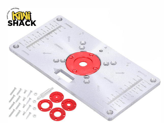 Kiwi Shack woodworking aluminum router table insert plate with metric scale, red insert rings, and mounting hardware.