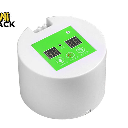 A white automatic smart watering timer pump device featuring a green control panel with dual digital displays, touch buttons, and dual water inlet/outlet ports on top against a white background, featuring the "Kiwi Shack" logo in the upper left corner.