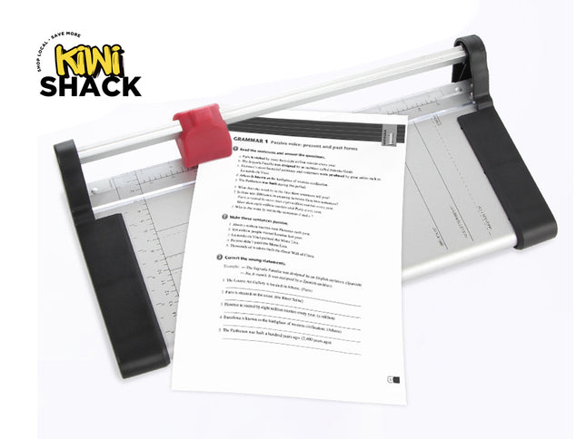 Paper cutter with a piece of paper on a white background, featuring the Kiwi Shack logo.