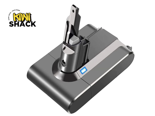 Dark grey replacement vacuum cleaner battery pack with vertical plug-in latch tower, a small glowing blue indicator light, and Kiwi Shack logo in top left.