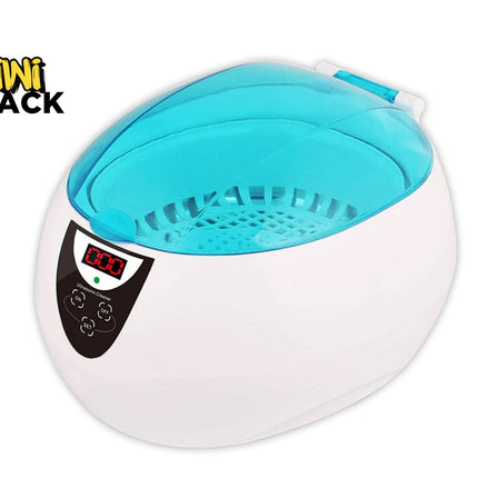 A white foot bath or ultrasonic cleaner with a translucent light blue interior and a black control panel featuring a digital display screen. The brand logo 'KIWI SHACK' is visible in the top-left corner.