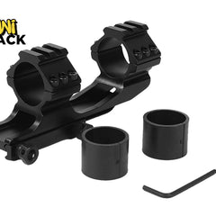 A black cantilever dual-ring rifle scope mount with integrated top rails, two plastic reducer inserts, and an Allen wrench set against a white background. A "Kiwi Shack" logo appears in the top-left corner.