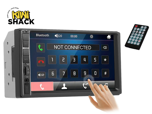 A Kiwi Shack car stereo head unit with a touchscreen display showing a call interface, alongside a separate black remote control and a hand touching the screen. The Kiwi Shack logo is visible in the top left corner.