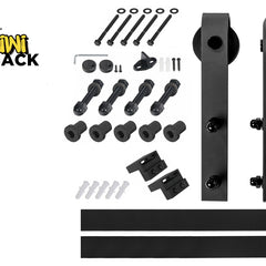 A black metal sliding barn door hardware kit from Kiwi Shack, laid out on a white background with the brand logo in the top left corner. The kit includes the door, roller assembly, track brackets, bolts, washers, and mounting hardware.