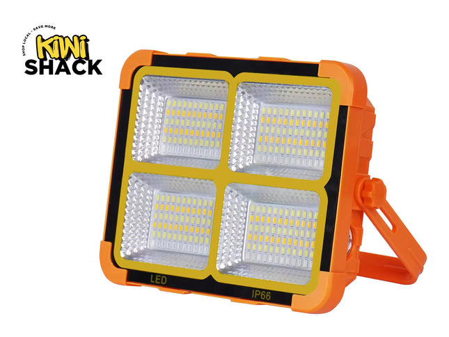 Orange and black LED flood light with 'Kiwi Shack' branding on a white background