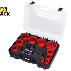 A set of red bi-metal hole saws of varying sizes with mandrels and pilot drill bits neatly arranged in a black storage case with a clear lid, set against a white background. A "Kiwi Shack" logo appears in the top-left corner.