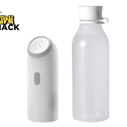 A white Kiwi Shack portable facial cleansing brush and matching water bottle set, shown on a plain white background with the Kiwi Shack logo in the top-left corner.