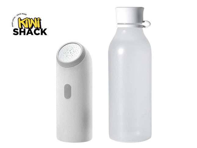 A white Kiwi Shack portable facial cleansing brush and matching water bottle set, shown on a plain white background with the Kiwi Shack logo in the top-left corner.