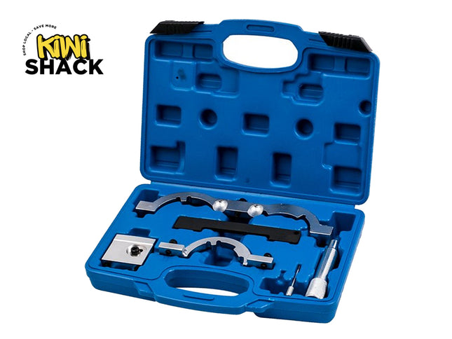 An open blue plastic molded storage case containing specialized automotive engine timing tools, including metal alignment brackets, a locking pin, and other components, set against a white background with the "Kiwi Shack" logo in the top left corner.