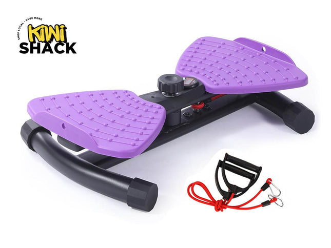 Purple and black mini stepper exercise machine with textured non-slip purple foot pedals, central hydraulic/tension adjustment knob and digital fitness monitor, curved stabilizing base bars with rubber end caps, detachable dual red resistance cord with black grip handles lying nearby, and the Kiwi Shack logo watermark.