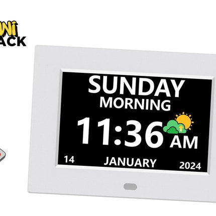 A white digital clock display with a black screen showing the time 11:36 AM and Sunday, January 14, 2024. A hand holding a small remote control appears in the lower left corner.