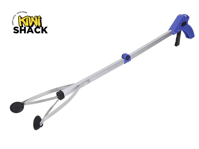 A long folding litter picker grabber tool with a silver aluminum shaft, a blue handle and trigger, and rubber-padded gripping claws against a white background, featuring the "Kiwi Shack" logo in the upper left corner.
