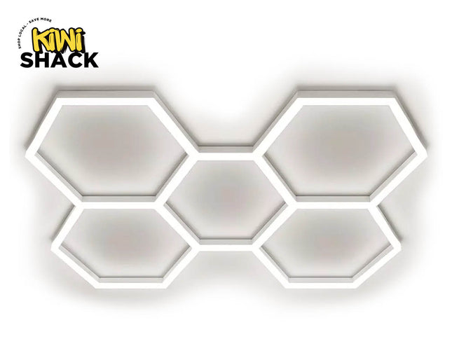 Modern hexagonal LED ceiling light fixture featuring a cluster of five interlocking illuminated geometric frames against a white background, with Kiwi Shack logo in top left.