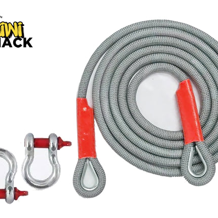 A coiled gray synthetic rope with red wrapped end sections and metal eye hooks, shown on a white background with two matching metal shackles. The Kiwi Shack logo appears in the upper left.