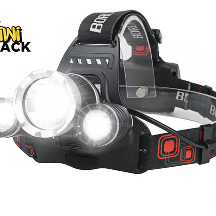Black multi-LED headlamp with three illuminated bright white beams (large center emitter and two smaller side lights), mounted on an elastic strap with red geometric patterns, clear plastic top support arch, coiled rear power cord, and two blue rechargeable batteries included in the lower right, branded with the "Kiwi Shack" logo in the top-left corner.