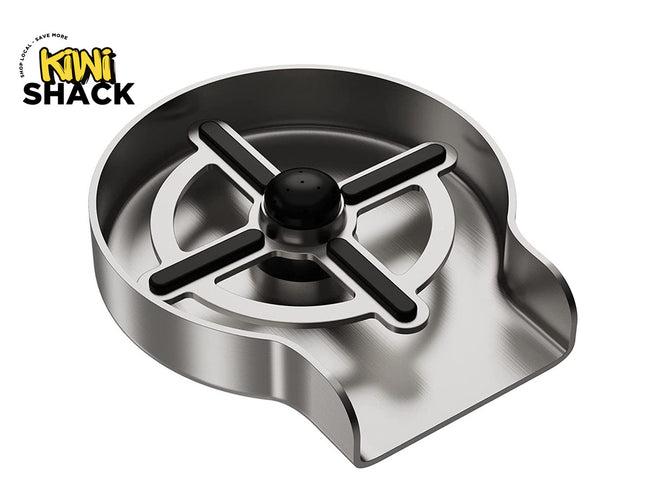 A stainless steel dog water bowl with a black central spout and black outer spout accents, shown on a white background with the Kiwi Shack logo in the top-left corner.