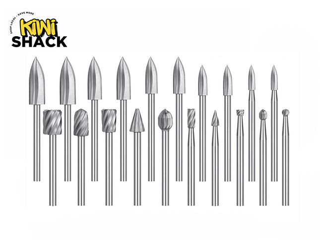 A set of metallic rotary burr bits in various shapes and sizes, arranged in a row on a plain white background. The Kiwi Shack logo is visible in the top-left corner.