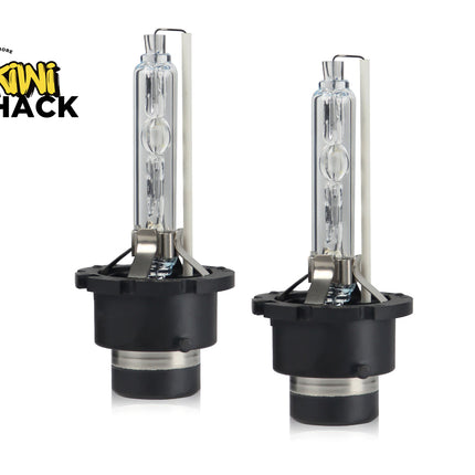 Two car headlights with black casings on a white background, branded 'Kiwi Shack'.