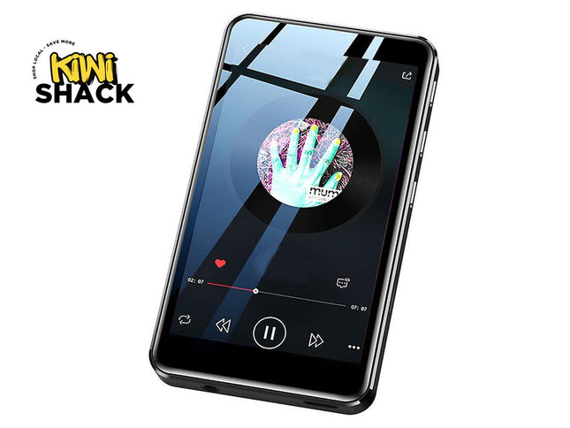 Black touchscreen digital MP5 media player displaying a music playback interface with album artwork, a progress bar, play/pause controls, and side physical buttons, branded with the "Kiwi Shack" logo in the top-left corner.