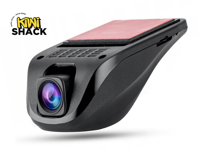 A black Kiwi Shack car-mounted dashcam with a pink protective cover attached to the top, shown on a white background with a Kiwi Shack logo in the top-left corner.