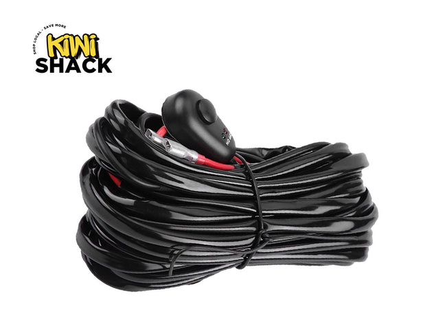 Coiled black cable with a switch on a white background, featuring the Kiwi Shack logo.