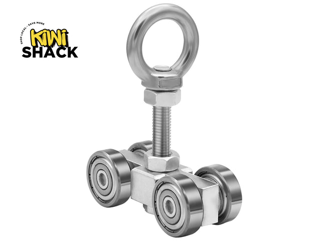 Silver metal trolley roller assembly with four ball-bearing wheels, a threaded bolt shaft, and a top eye nut, featuring the Kiwi Shack logo in the top left.