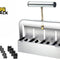 Kiwi Shack heavy-duty stainless steel four-block soil blocker tool for seed starting and gardening with multiple interchangeable mold inserts.