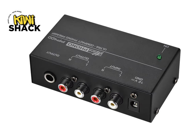 Audio interface with multiple connectors on a white background, branded 'Kiwi Shack'.