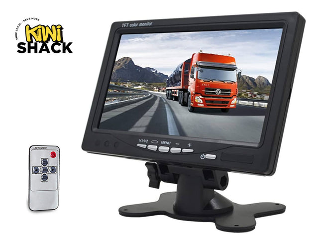 7-inch car monitor displaying a truck on a road with a remote control on a white background, featuring the Kiwi Shack brand.