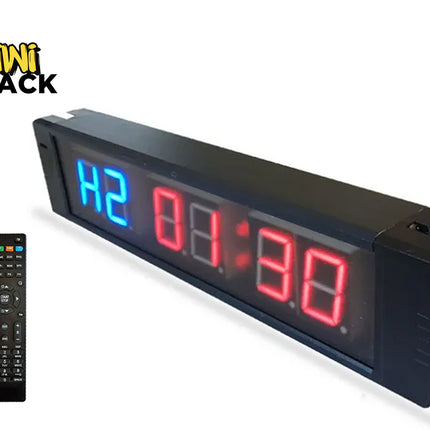 Digital clock with remote control on a white background, featuring the Kiwi Shack brand.