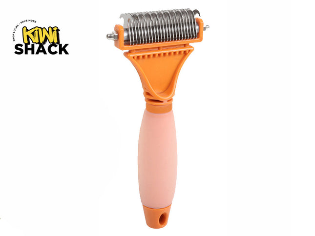 Kiwi Shack pet grooming tool featuring an orange plastic handle and a metal roller with fine teeth, set against a plain white background with a Kiwi Shack logo in the top-left corner.