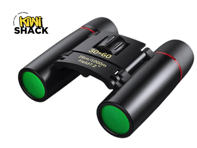 Black binoculars with green lenses on a white background, featuring the Kiwi Shack brand.