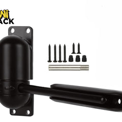 An adjustable black automatic door closer mechanism with mounting hardware screws and a pin, featuring the "Kiwi Shack" logo in the top-left corner.