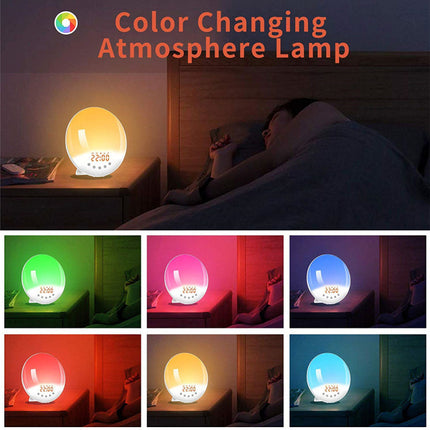 Color changing atmosphere lamp shown in a bedroom scene with a sleeping person, plus eight smaller color options below. The main lamp glows warm yellow/orange, and the text at the top reads 'Color Changing Atmosphere Lamp'.