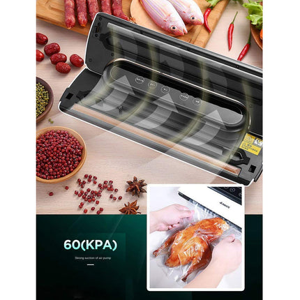 Vacuum sealer with food items on a table
