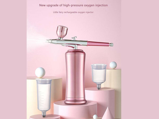 A pink and silver high-pressure oxygen atomizer machine displayed on a pink pedestal with two white bottles, set against a soft pink background with promotional text at the top.