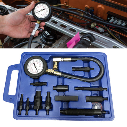 Mechanic using a pressure gauge on a car engine with a blue tool kit containing various components below.