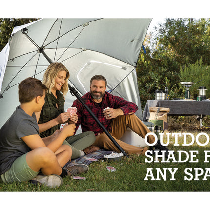 Family sitting under a large outdoor umbrella in a park setting with text 'Outdoor Shade for Any Space'.