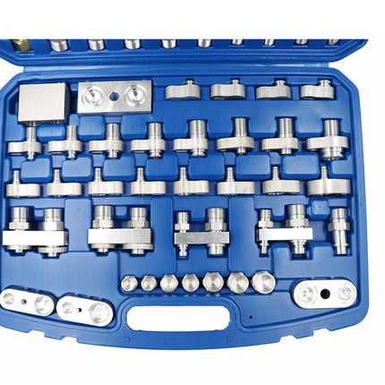 Blue tool kit with various metallic tools on a white background