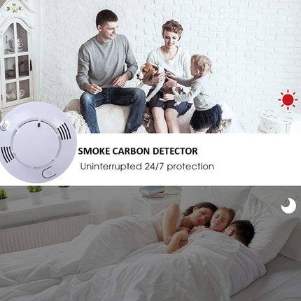 Family with a smoke carbon detector and a child sleeping in bed.