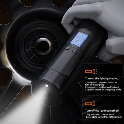 A black tire pressure gauge with a digital display and built-in LED light is shown being used on a car tire, with a gloved hand holding the device. An instructional overlay on the right explains how to turn the light on and off.