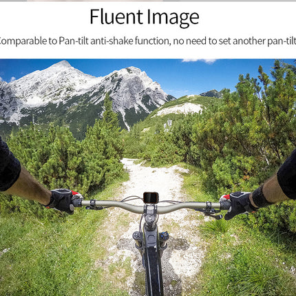First-person view from a mountain bike on a trail with mountains in the background