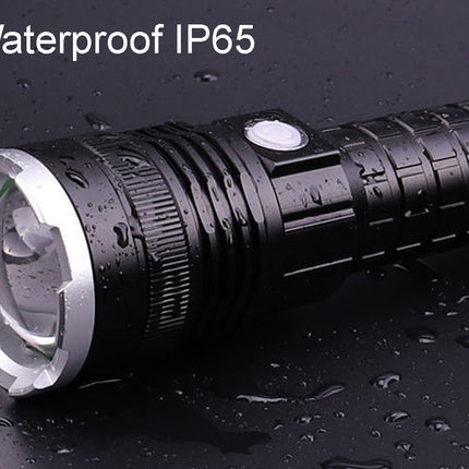Black flashlight with 'Waterproof IP65' text on a dark background