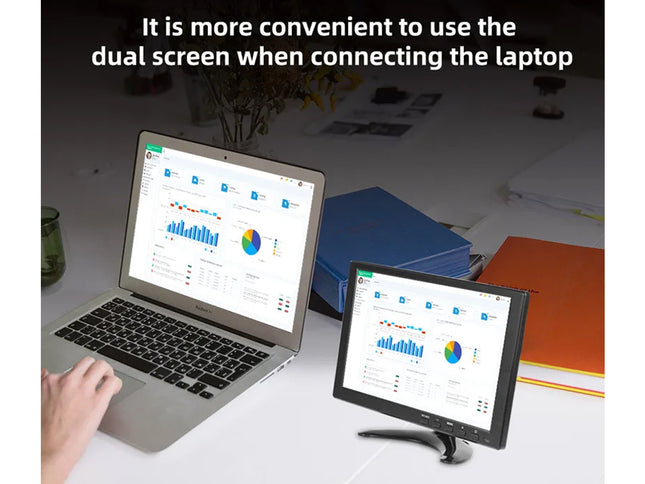 Laptop with dual screen displaying financial data on a desk.