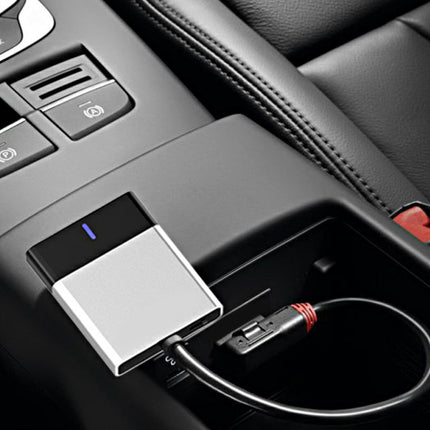 Car cup holder with a USB device and cable inside