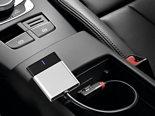 Car cup holder with a USB device and cable inside